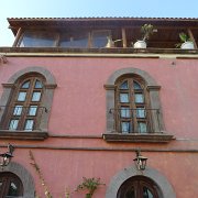 A historical hotel in the center of the town. Look at the unprotected pots upstairs. : Baja2011
